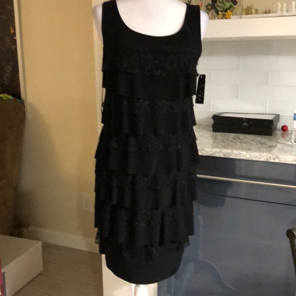 Tiana B. Dresses & Skirts - Fits 6 Tiana black ruffle knee length dress